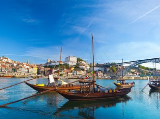 old porto and traditional boats with wine barrels, portugal 
