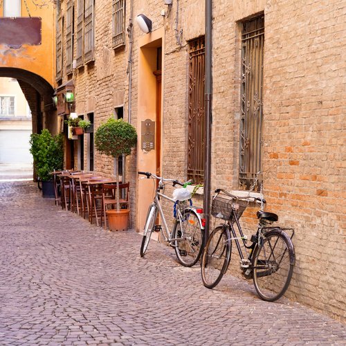 Old Small Stone Medieval Street in Historical Center of Ferrara - Italy Package Tour from India