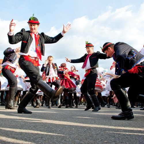 people in folk costume dance verbunk on the biggest folk feast in czech