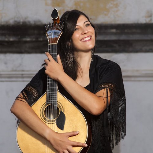 performer woman of traditional portuguese fado music(header). 