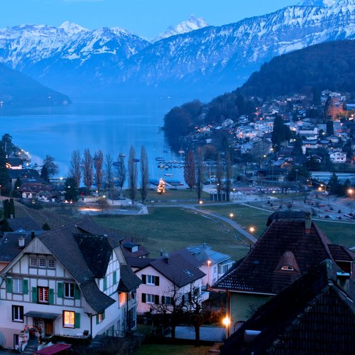 spiez castle and alps night scene switzerland(header ) - Europe Vacation Packages from India